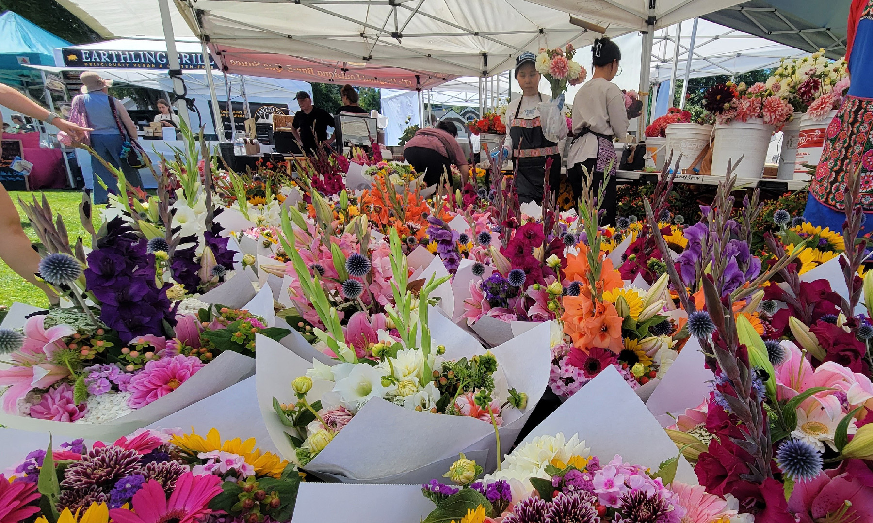 Flowers are among the many possible purchases at the farmers market in Gig Harbor, Washington.