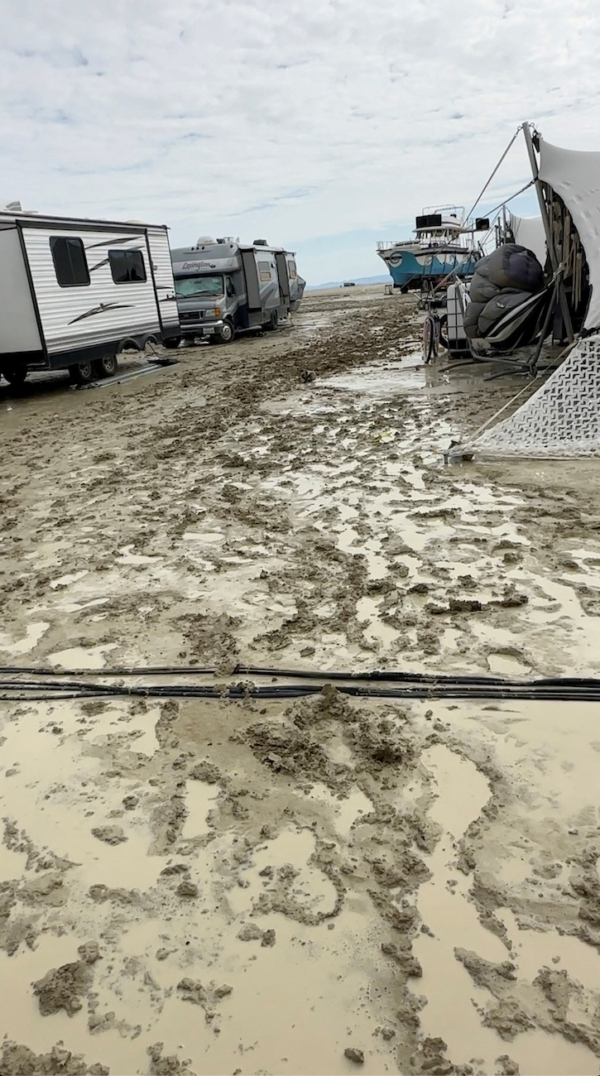 Rain And Mud Leave Burning Man Revelers Stranded In Nevada Desert