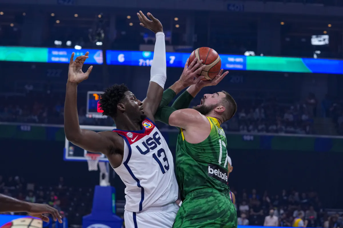 Lithuania center Jonas Valanciunas (17) shoots over U.S. forward Jaren Jackson Jr. (13) during the first half of a Basketball World Cup second-round match in Manila, Philippines on Sept. 3, 2023.(Michael Conroy/AP Photo)
