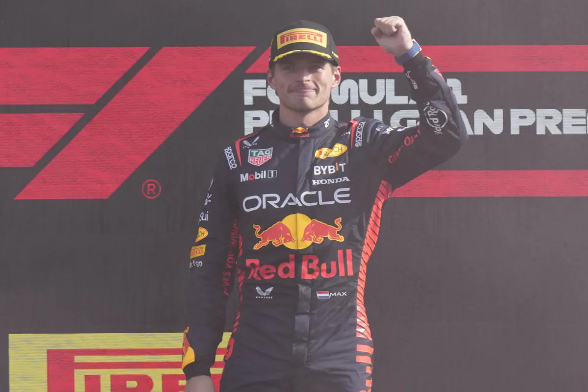 Red Bull driver Max Verstappen of the Netherlands celebrates on the podium after winning the Formula One Italian Grand Prix auto race at the Monza racetrack in Monza, Italy, on Sept. 3, 2023. (Luca Bruno/AP Photo)