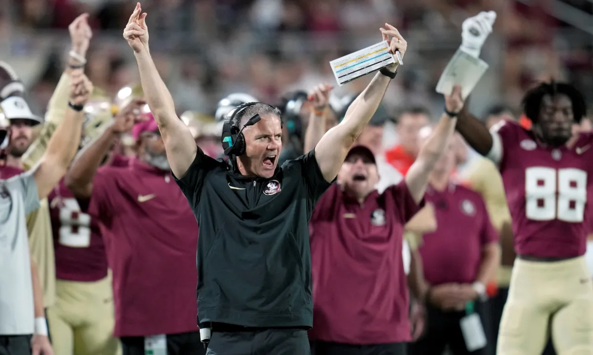 Florida State head coach Mike Norvell (C), reacts to players on the field after a timeout during the first half of an NCAA college football game against LSU in Orlando, Fla., on Sept. 3, 2023. (John Raoux/AP Photo)