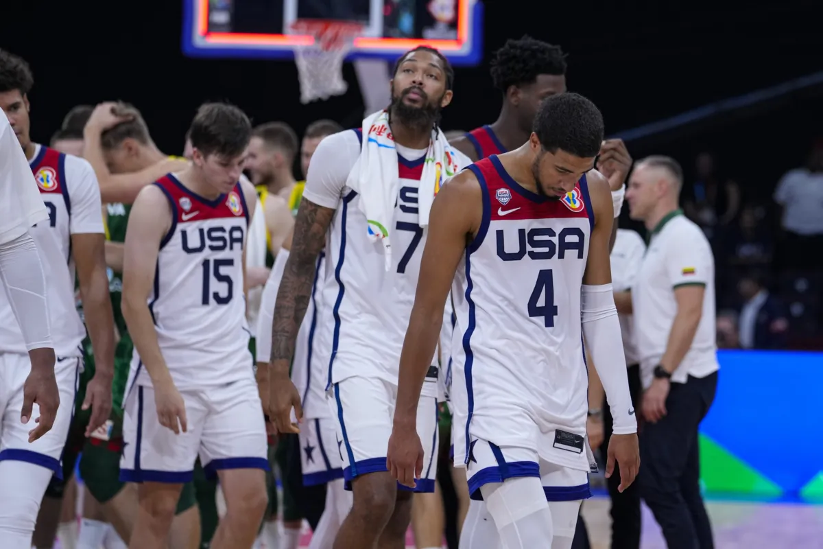 U.S. guard Tyrese Haliburton (4) leads the team off the court after a loss to Lithuania in a Basketball World Cup second-round match in Manila, Philippines, on Sept. 3, 2023. (Michael Conroy/AP Photo)