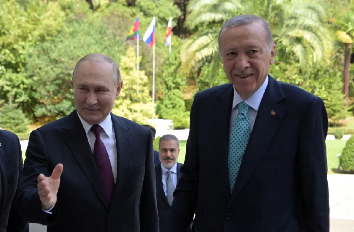 Russian President Vladimir Putin greets his Turkish counterpart Recep Tayyip Erdogan before their talks in Sochi, Russia, on Sept. 4, 2023. (Alexey Nikolsky/Pool/AFP via Getty Images)