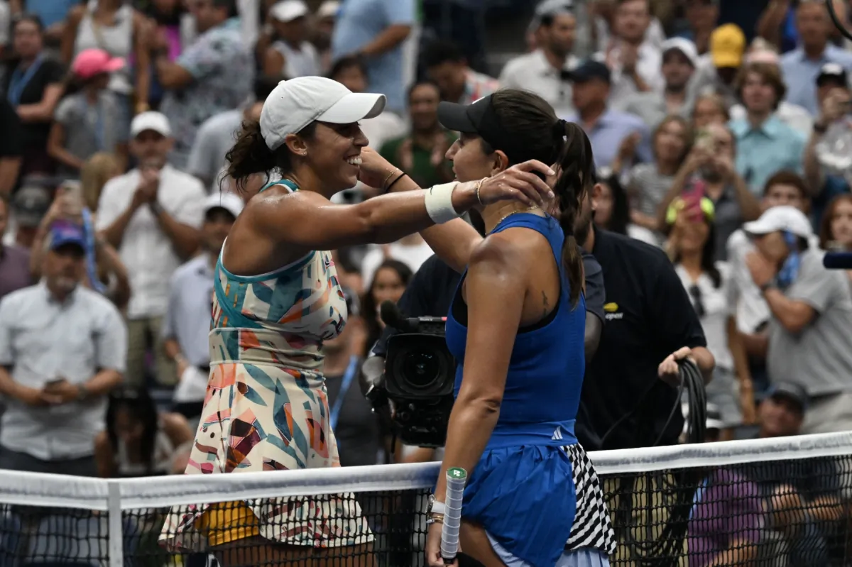 USA's Madison Keys embraces USA's Jessica Pegula after her win during the US Open tennis tournament women's singles round of 16 match at the USTA National Tennis Center in New York City, on Sept. 4, 2023. (Ed Jones/AFP via Getty Images)