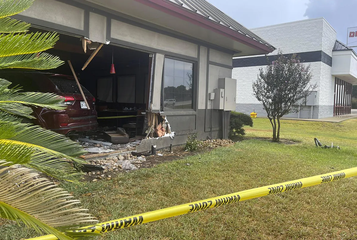 Police tape in front of a Denny's restaurant after a vehicle crashed into it in Rosenberg, Texas, on Sept. 4, 2023. (Rosenberg Police Department via AP)
