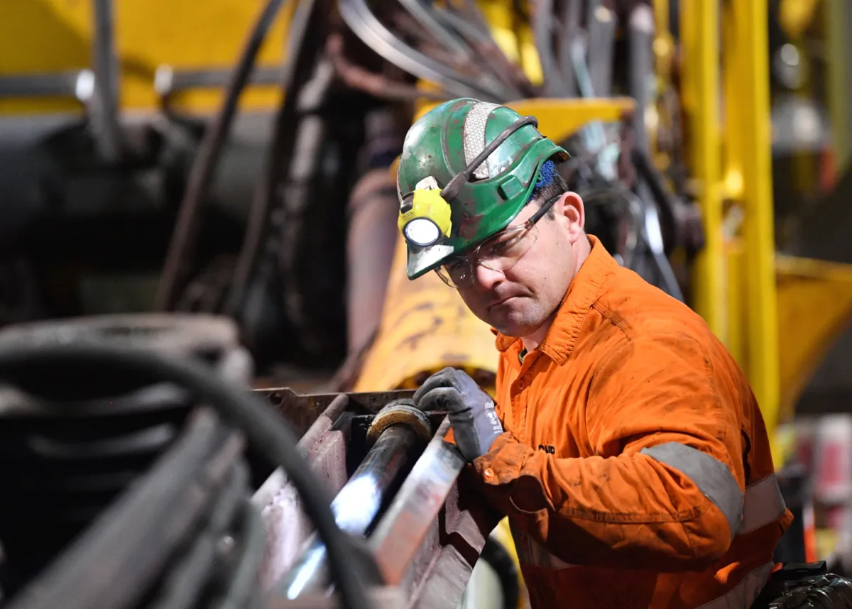 A BHP worker is seen during a tour of the Olympic Dam mine site in Roxby Downs, South Australia, on Aug. 30, 2019. (AAP Image/David Mariuz)