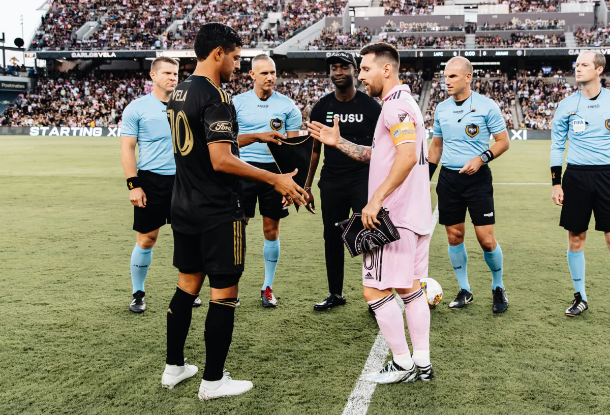 LAFC forward (10) Carlos Vela shakes hand with Miami forward (10) Lionel Messi prior to the kick-off Major League Soccer (MLS) football match between Inter Miami CF and Los Angeles FC at BMO Stadium in Los Angeles on Sept. 3, 2023. (Courtesy of LAFC via The Epoch Times) 