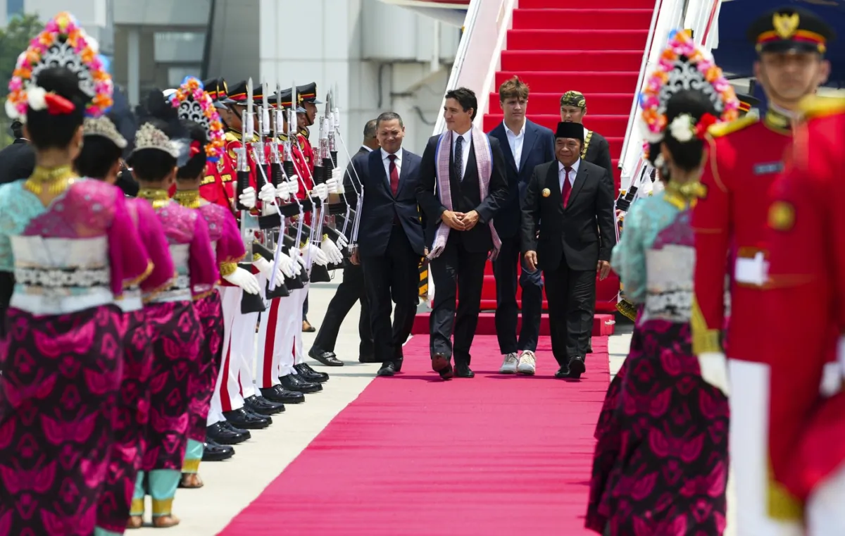 Prime Minister Justin Trudeau arrives in Jakarta, Indonesia on Sept. 5, 2023, to attend the ASEAN Summit. Trudeau is accompanied by his son Xavier Trudeau. (The Canadian Press/Sean Kilpatrick)