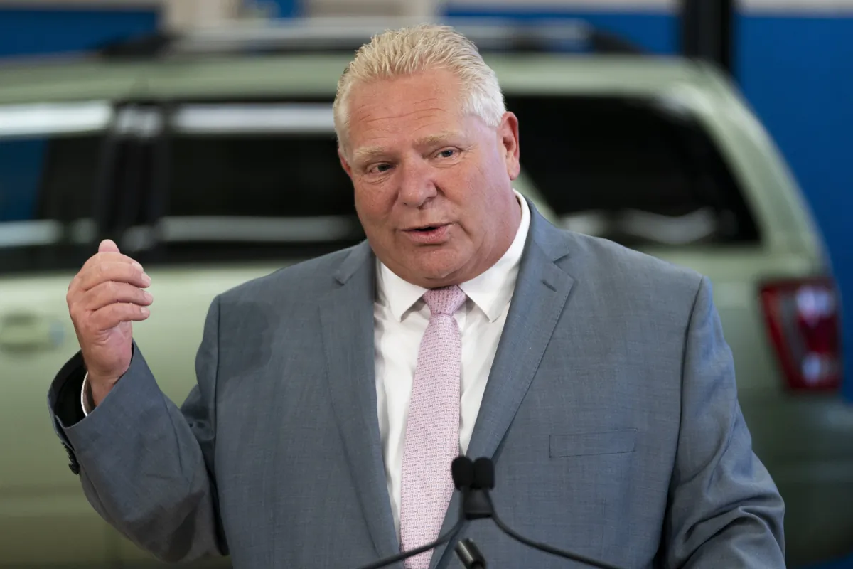 Ontario Premier Doug Ford delivers remarks at Lakeshore Collegiate Institute in Toronto on Aug. 31, 2023. (The Canadian Press/Spencer Colby)