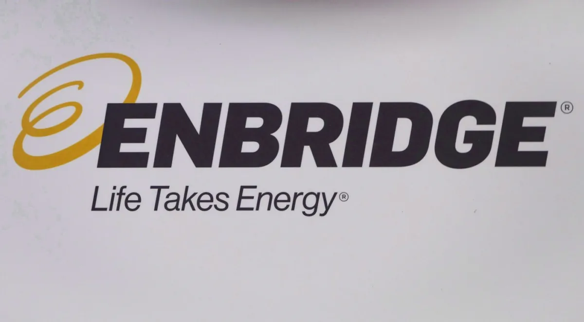 The Enbridge logo is shown at the company's annual meeting in Calgary on May 9, 2018.  (The Canadian Press/Jeff McIntosh)