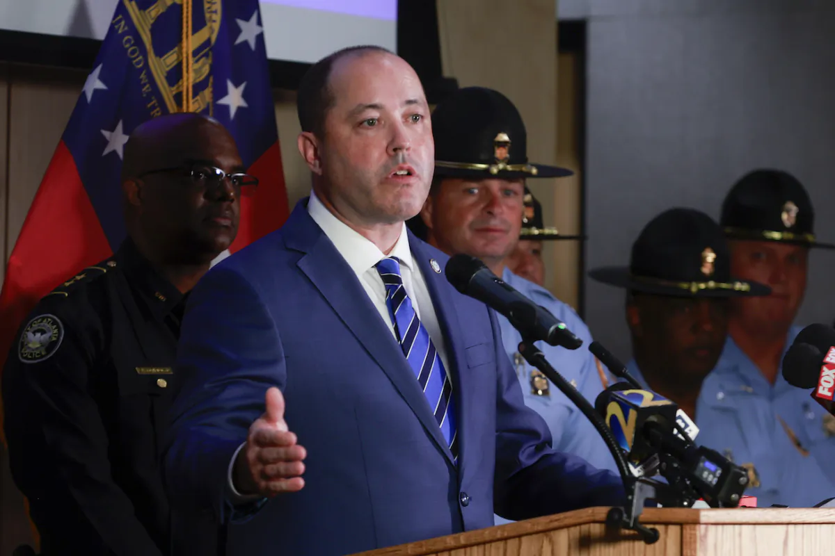 Georgia Attorney General Chris Carr speaks during a news conference to discuss the recent indictment of 61 defendants in Fulton County, at the Georgia Department of Public Safety in Atlanta, on Sept. 5, 2023. (Natrice Miller/Atlanta Journal-Constitution via AP)