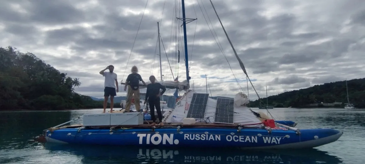 Vincent Thomas Etienne, Evgeny Kovalevsky, and Stanislav Berezkin, the three people rescued after sharks attacked a yacht off the Australian coast, pose for a photo in Vanua Levu Island, Fiji, Australia, on July 31, 2023. (Russian Ocean Way/Handout via Reuters)