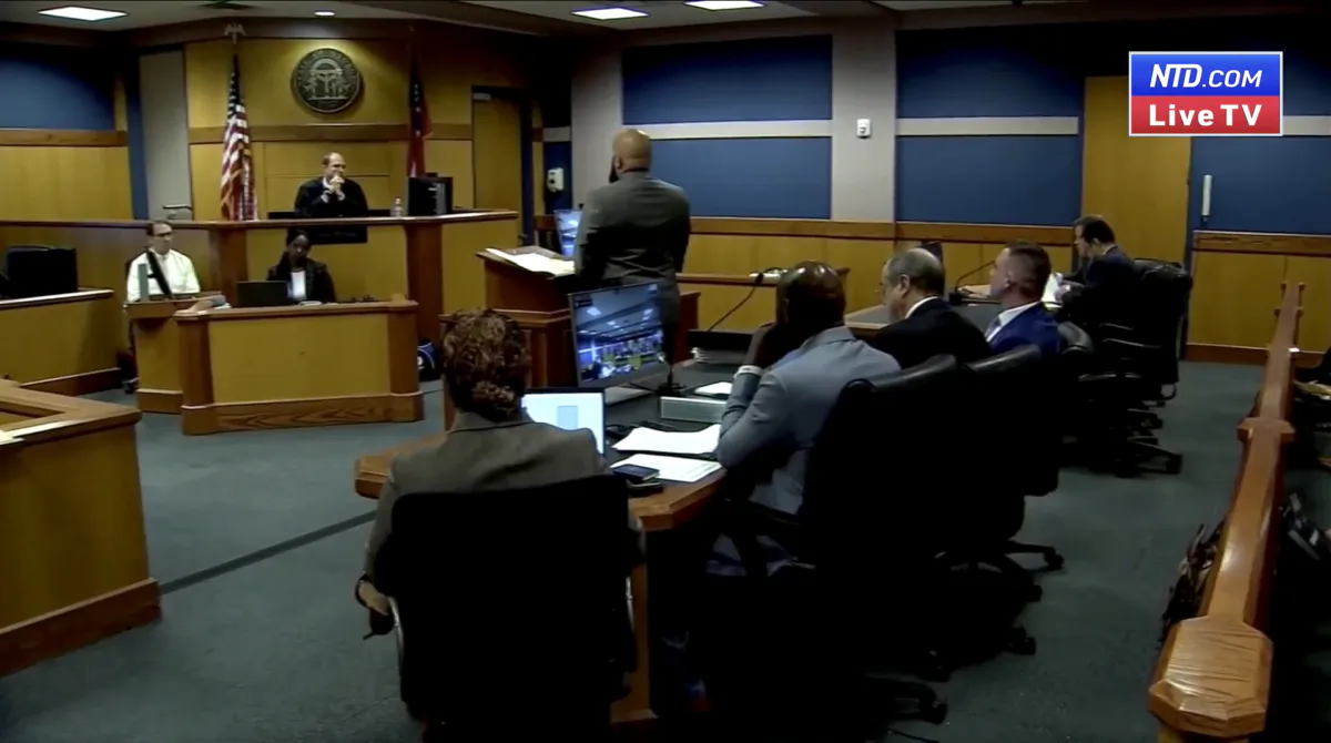 Fulton County Superior Court Judge Scott McAfee presides over a severance hearing for co-defendants Kenneth Chesebro and Sidney Powell, who are requesting their cases be severed from each other, as well as the others charged in this case, in Atlanta on Sept. 6, 2023, in a still from video. (Atlanta Pool via Reuters/Screenshot via NTD)