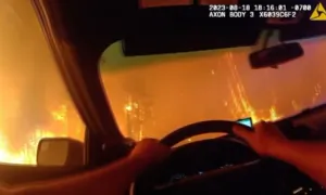 Driving Through Wildfire: Deputy Narrowly Escapes Oregon Road Fire Flames