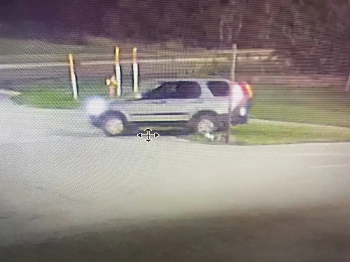 A vehicle driven by a person suspected of setting fire and shooting at multiple Michigan State Police patrol vehicles in the state's Upper Peninsula. (Michigan State Police via AP)