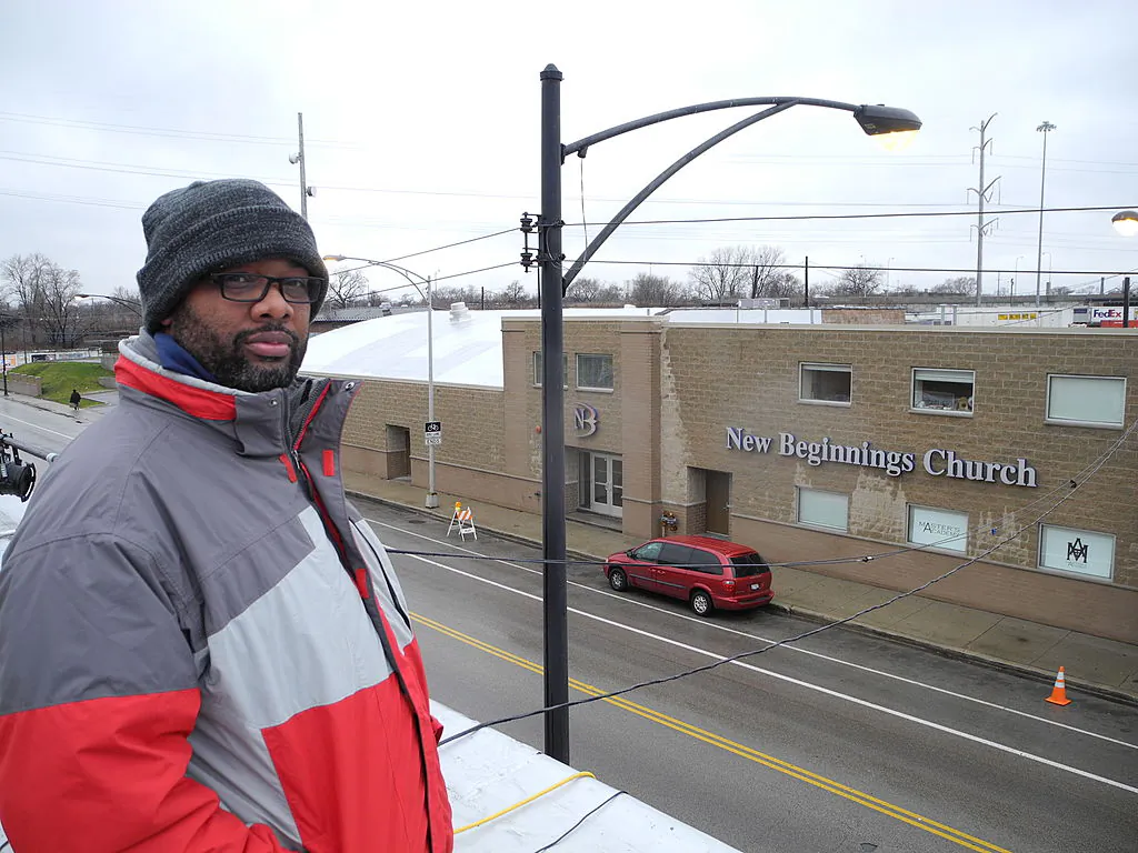 Pastor Corey Brooks in a 2011 photo during his protest against policies allowing for violence in south Chicago. Just a few miles from former President Barack Obama's luxurious house are neighborhoods bereft of hope where small children are hit by stray bullets walking home from school and the elderly are afraid to step outside, he noted in an AFP story at the time.(Mira Oberman/AFP via Getty Images)