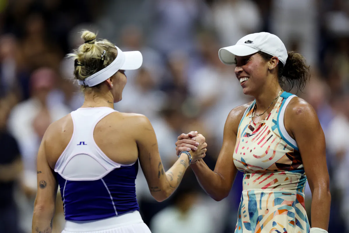 Madison Keys of the U.S. shakes hands with Czech Republic's Marketa Vondrousova after winning her quarter final match at Flushing Meadows, New York on Sept. 6, 2023. (Shannon Stapleton/Reuters)