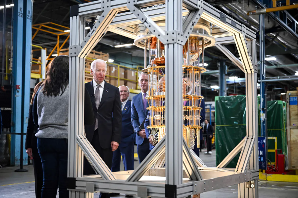 President Joe Biden looks at a quantum computer as he tours the IBM facility in Poughkeepsie, N.Y., on Oct.  6, 2022. IBM hosted the president to celebrate the announcement of a $20 billion investment in semiconductors, quantum computing, and other cutting-edge technology in New York state. (Mandel Ngan/AFP via Getty Images)