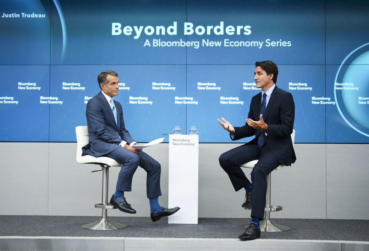 Prime Minister Justin Trudeau takes part in an armchair discussion with Bloomberg New Economy Editorial Director Erik Schatzker at Bloomberg in Singapore on Sept. 7, 2023. (Sean Kilpatrick/The Canadian Press)