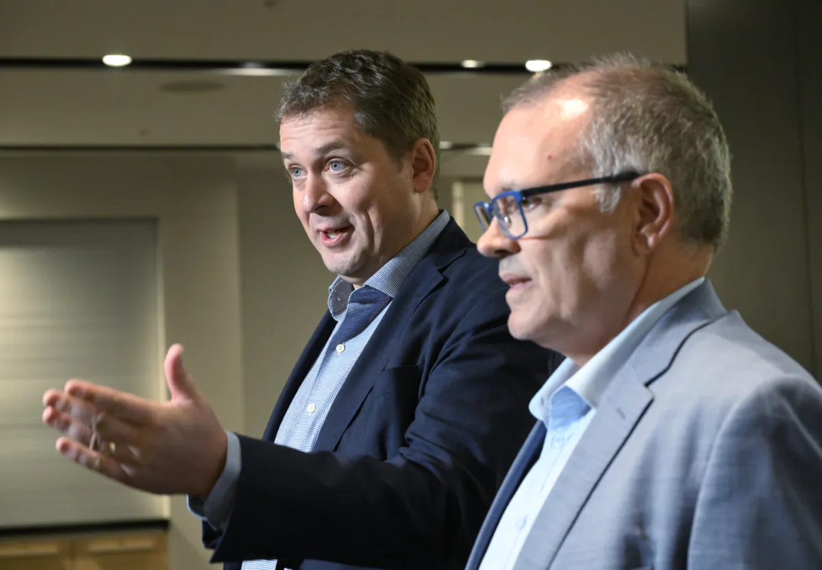 Conservative House Leader Andrew Scheer (L) speaks at a news conference related to Prime Minister Justin Trudeau’s decision to call a public inquiry, in Quebec City on Sept. 7, 2023. (Jacques Boissinot/The Canadian Press)