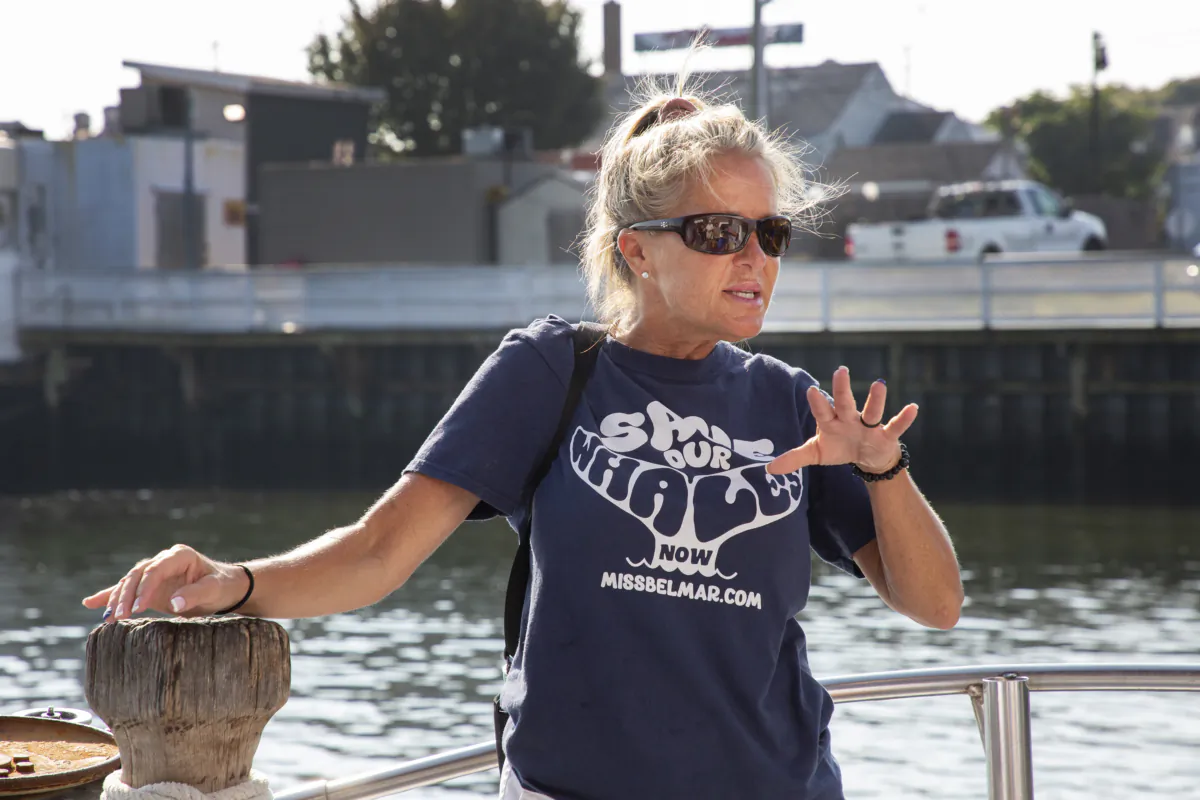 Conservation biologist and founder of the SaveOurWhalesNow organization, Trisha DeVoe, on Sept 6., 2023, in Belmar, New Jersey. (Richard Moore/The Epoch Times)