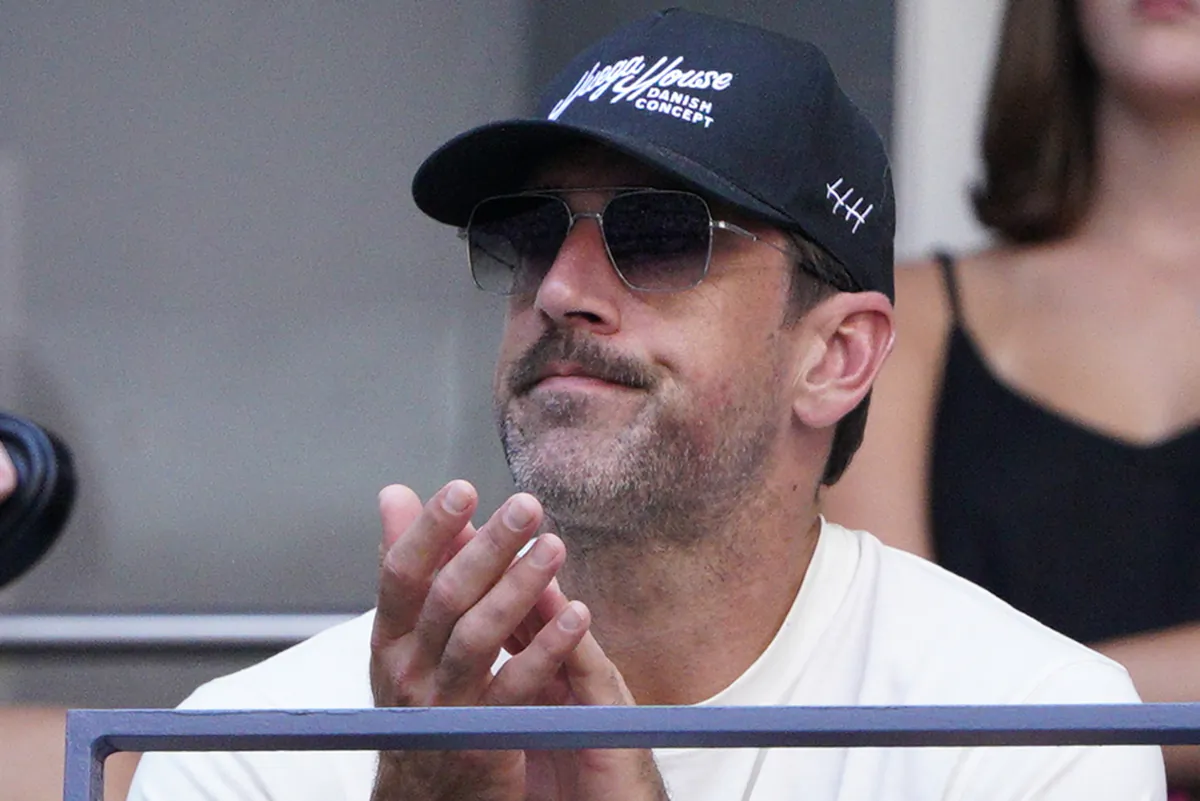 New York Jets quarterback Aaron Rodgers watches Coco Gauff, of the United States, face Caroline Wozniacki, of Denmark, during the fourth round of the U.S. Open tennis championships in New York on Sept. 3, 2023. (Eduardo Munoz Alvarez/AP Photo)