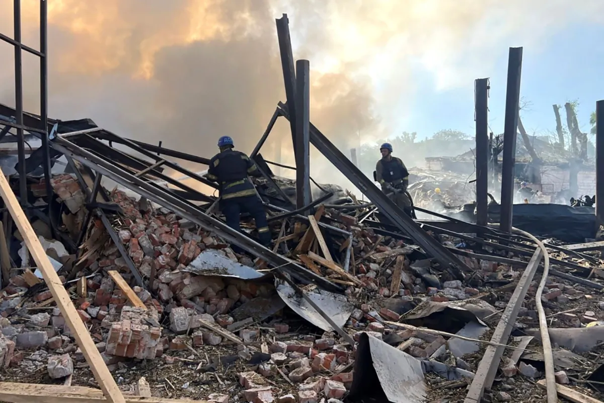 Emergency services personnel work to extinguish a fire following a Russian attack in Kryvyi Rih, Ukraine, on Sept. 8, 2023. (Ukrainian Emergency Service via AP)