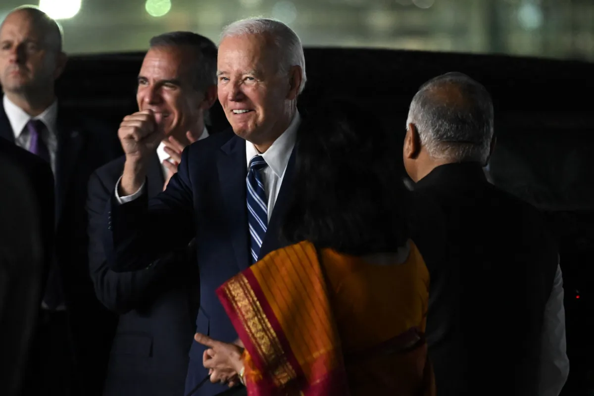 U.S. President Joe Biden (C) gestures upon his arrival at the airport on the eve of the two-day G20 summit in New Delhi on Sept. 8, 2023. (Saul Loeb/AFP via Getty Images)