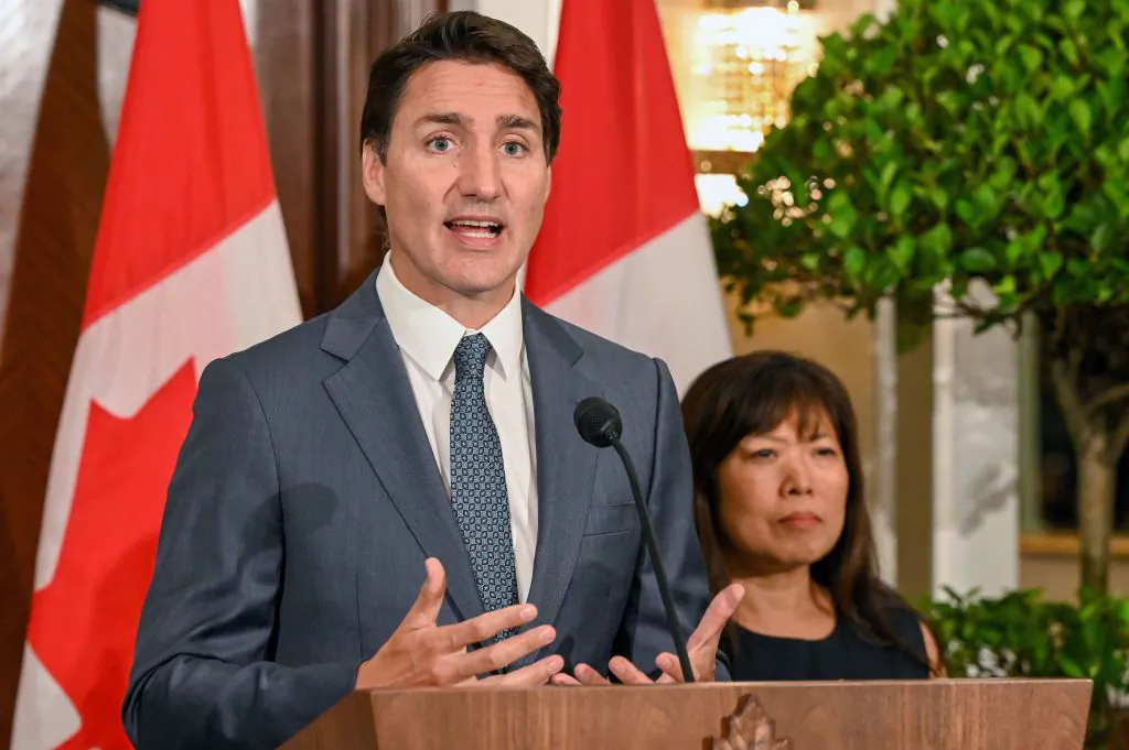 Prime Minister Justin Trudeau speaks next to International Trade Minister Mary Ng at a press conference during a stopover visit to Singapore on Sept. 8, 2023. (Roslan Rahman/AFP via Getty Images)