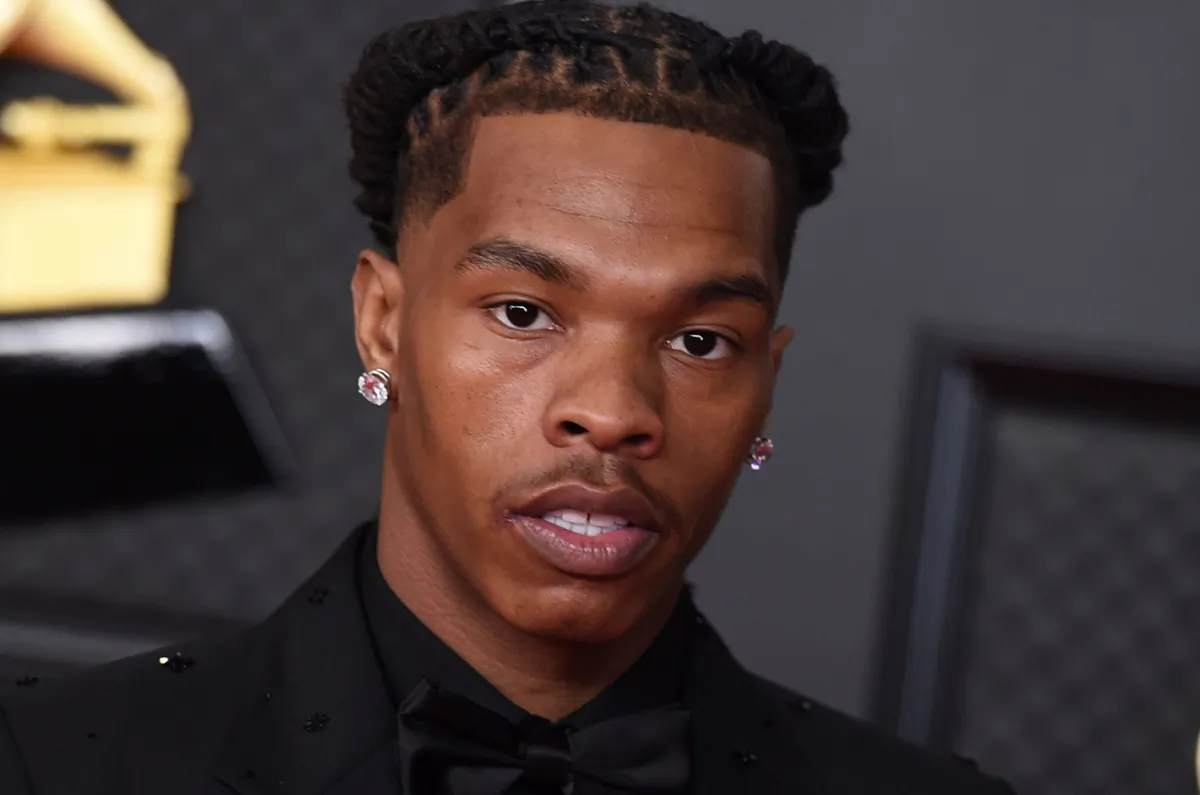Lil Baby poses in the press room at the 63rd annual Grammy Awards at the Los Angeles Convention Center in Los Angeles on March 14, 2021. (Jordan Strauss/Invision/AP)