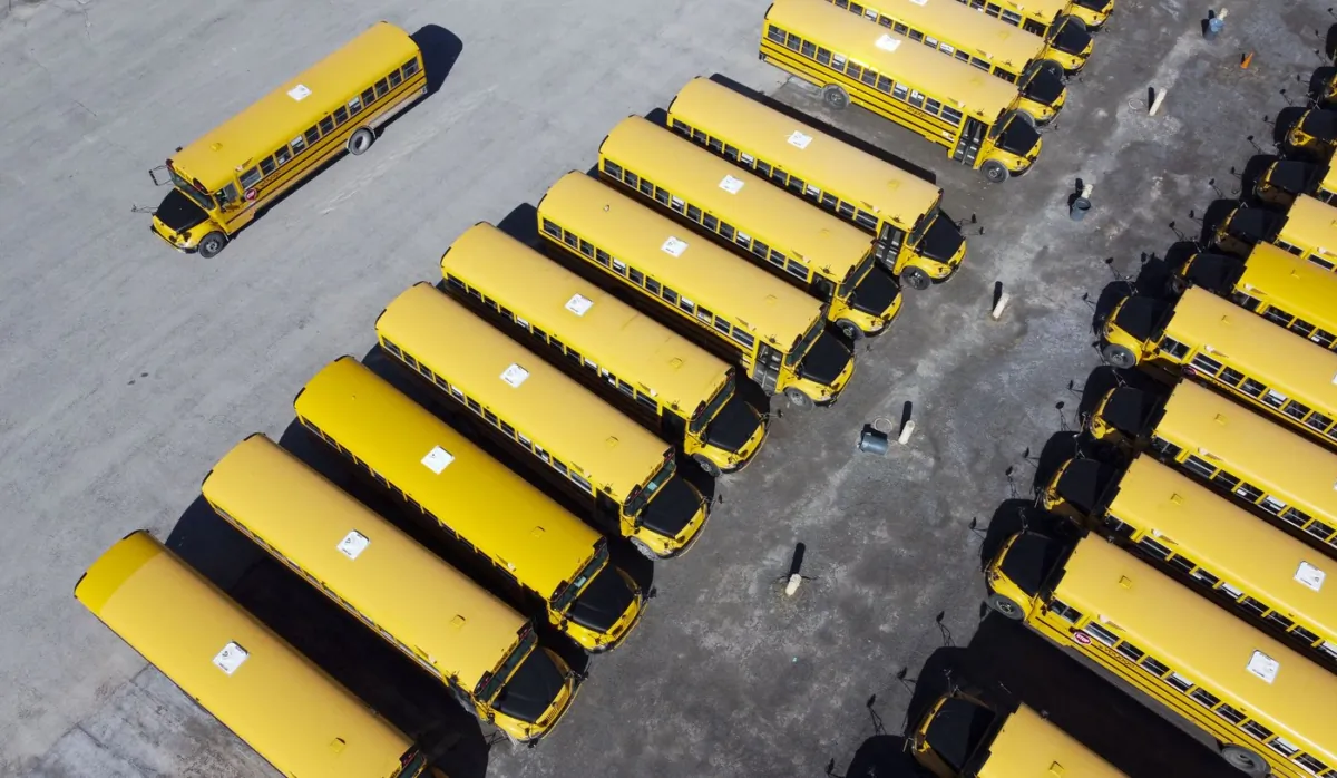  In this photo taken using a drone, school buses are seen in a lot in Ottawa on April 18, 2022. (The Canadian Press/Sean Kilpatrick)