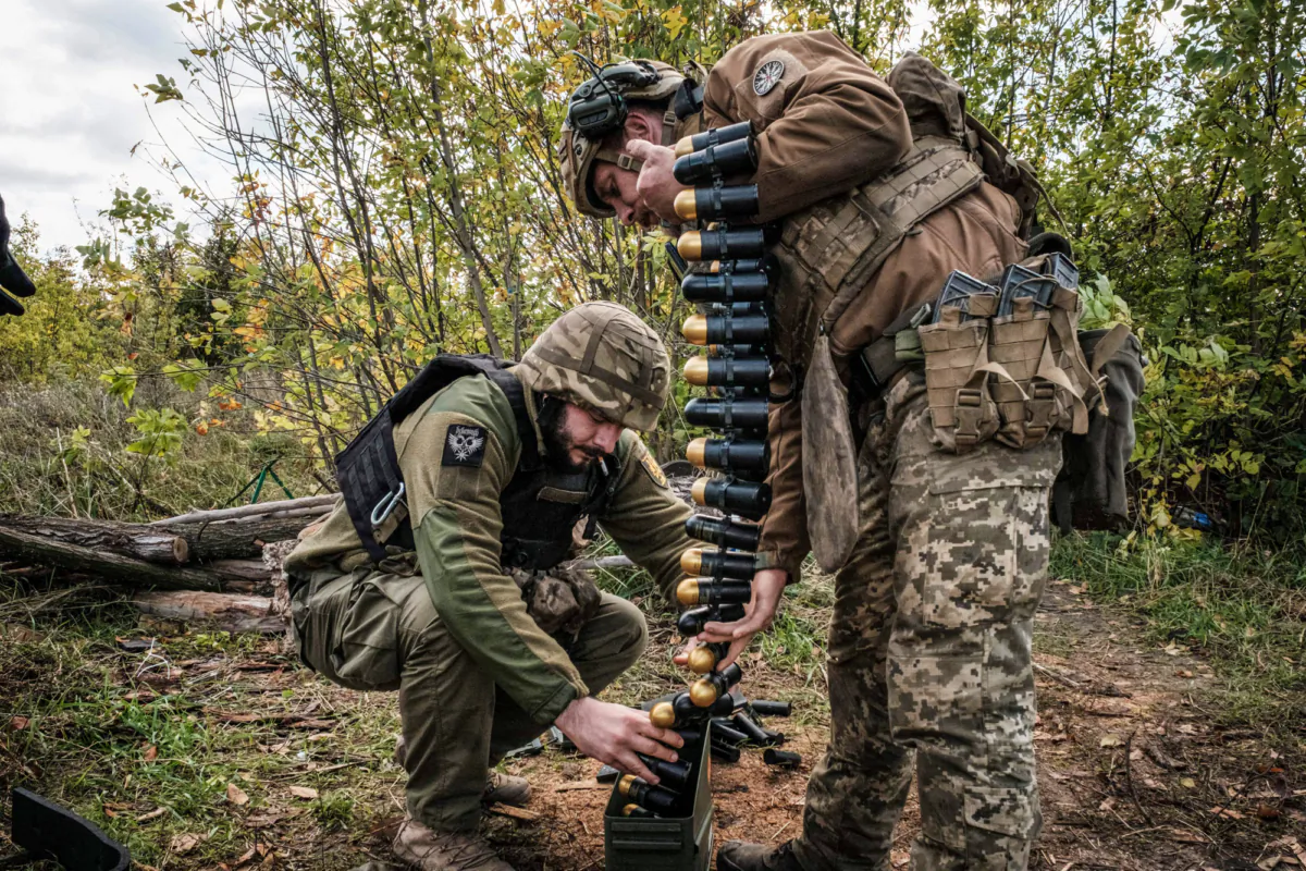 Ukrainian soldiers preparing U.S.-made MK-19 automatic grenade launcher towards at a front line near Toretsk, Ukraine, on Oct. 12, 2022. (Yasuyoshi Chiba/AFP via Getty Images)