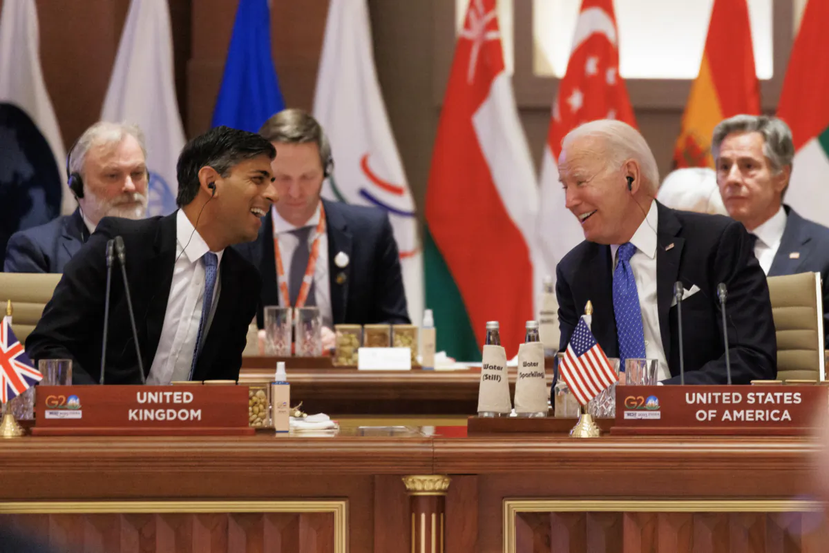 British Prime Minister Rishi Sunak speaks to US President Joe Biden during the G20 Leaders' Summit in New Delhi, Delhi on Sept. 9, 2023. (Dan Kitwood/Getty Images)