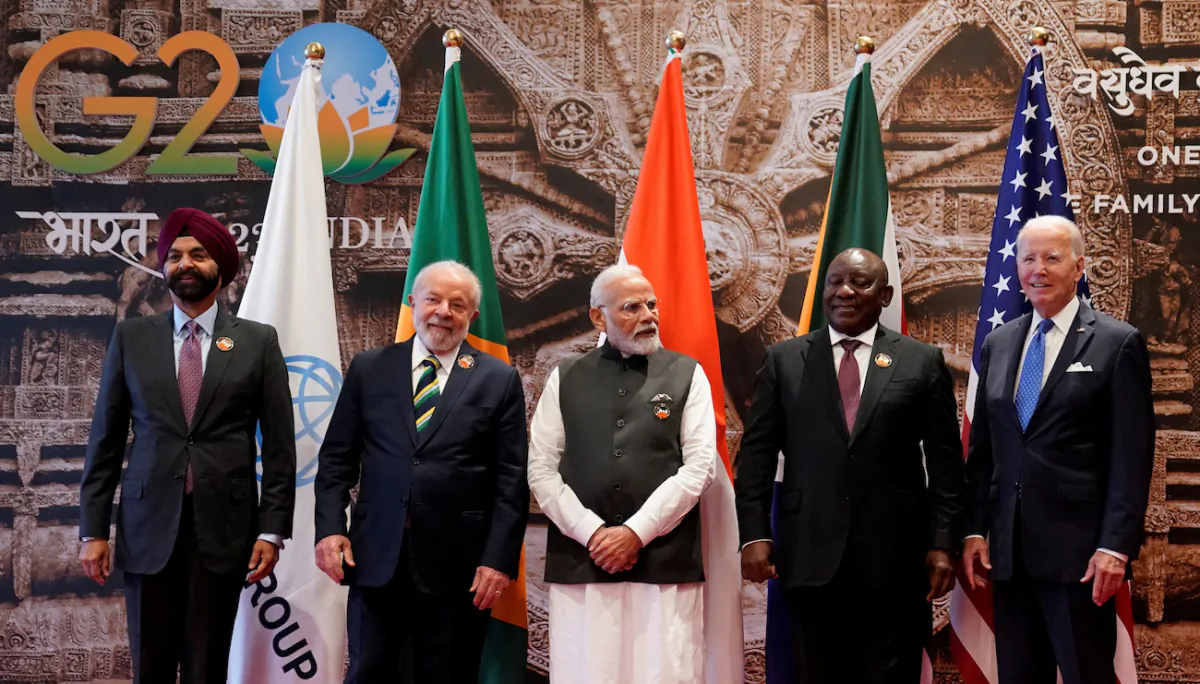 (L–R) World Bank President Ajay Banga, Brazilian President Luiz Inacio Lula da Silva, Indian Prime Minister Narendra Modi, South African President Cyril Ramaphosa and U.S. President Joe Biden pose for a group photo during the G20 Summit, in New Delhi, India, on Sept. 9, 2023. (Evan Vucci/Pool via Reuters)