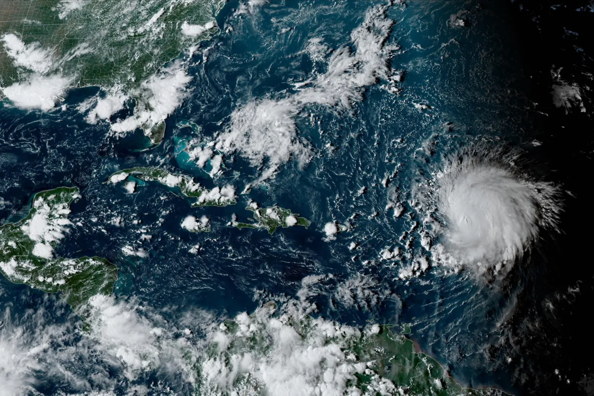 Hurricane Lee (R) in the Atlantic Ocean at at 4:50 p.m. ET on Sept. 8, 2023. (NOAA via AP)