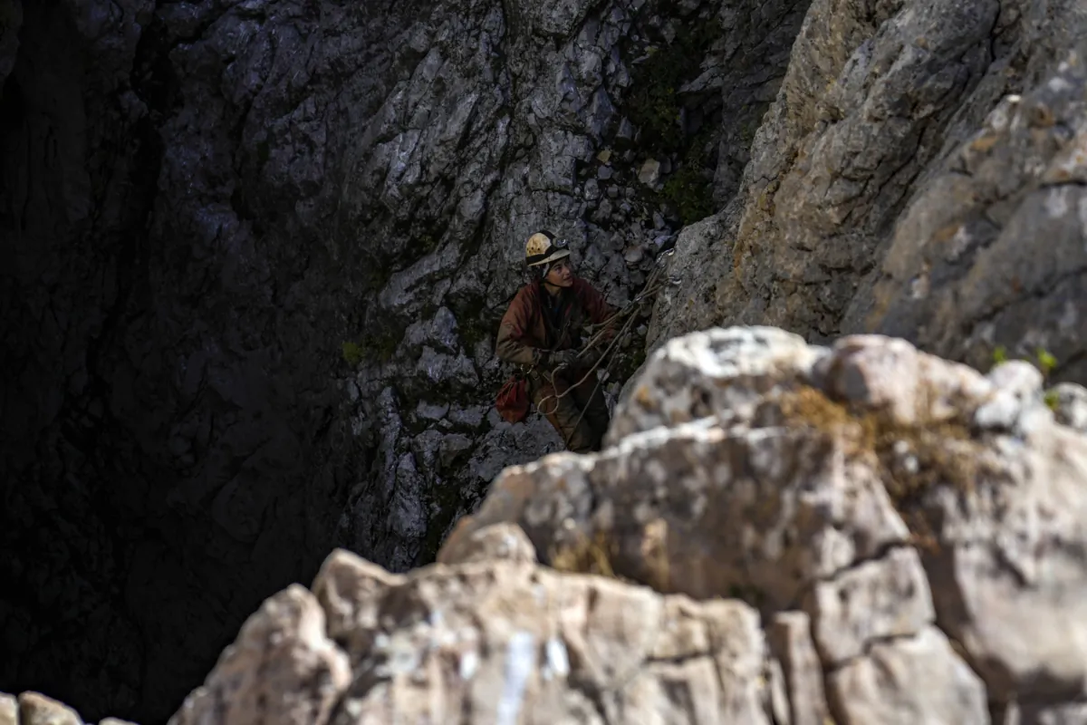 A European Cave Rescue Association (ECRA) member, goes down into the Morca cave near Anamur, southern Turkey, on Sept. 8, 2023. (Khalil Hamra/AP Photo)