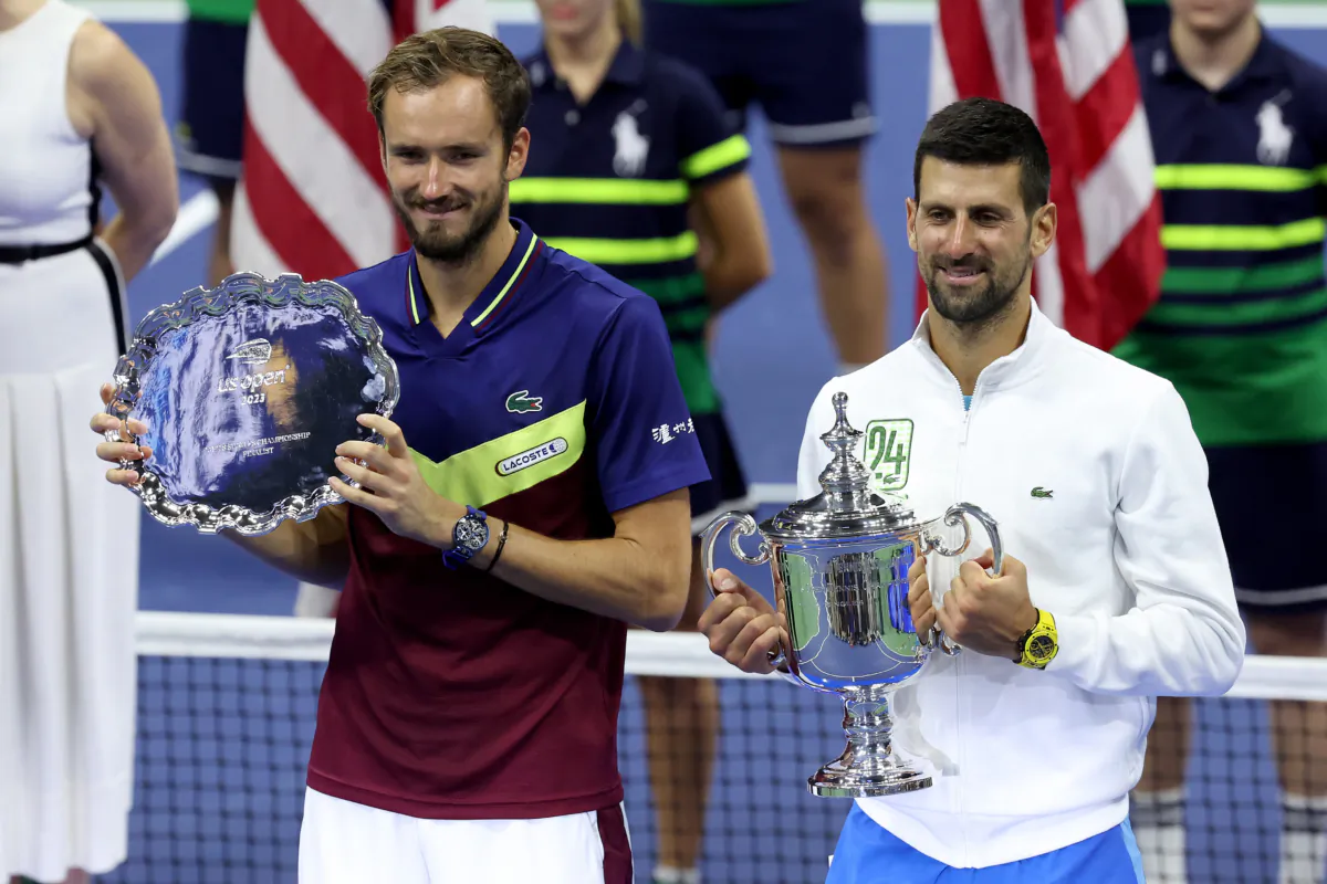 Finalist Daniil Medvedev (L) of Russia and champion Novak Djokovic of Serbia pose with the trophies following their Men's Singles Final match on Day Fourteen of the 2023 US Open at the USTA National Tennis Center on Sept. 10, 2023 in the Flushing neighborhood of New York City. (Al Bello/Getty Images)