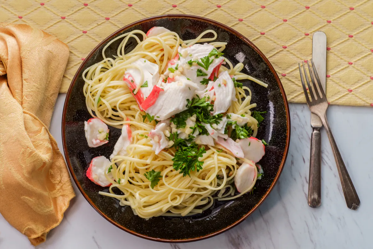 Serve the crab sauce over spaghetti and enjoy this quick Italian seafood dinner. (Ezume Images/Shutterstock)