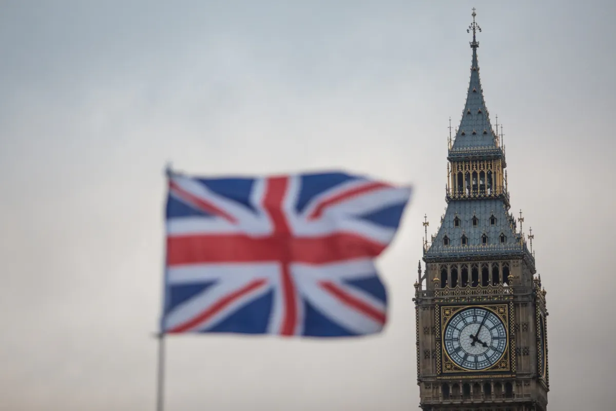 A Union Jack flag flutters in front of the Elizabeth Tower, commonly known as Big Ben, in London in a file photo. (Jack Taylor/Getty Images)