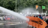 Dutch Police Use Water Cannon to Clear Climate Activists From Highway