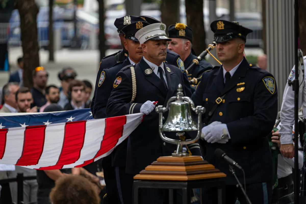 Firefighters and members of the police take part in the ceremony at the 9/11 Memorial and Museum at the Ground Zero site in lower Manhattan during commemoration ceremonies for the 22nd anniversary of the 9/11 attacks, on September 11, 2023, in New York. (Spencer Platt/Getty Images)
