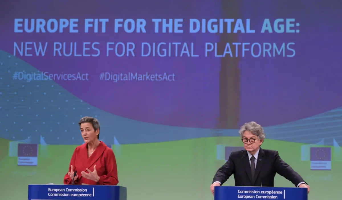 Margrethe Vestager, executive vice president of the European Commission for A Europe Fit for the Digital Age and European Commissioner for Competition, and EU Internal Market Commissioner Thierry Breton participate in a press conference on the Digital Services Act and the Digital Markets Act in Brussels, Belgium, on Dec. 15, 2020. (Alexandros Michailidis/Shutterstock)