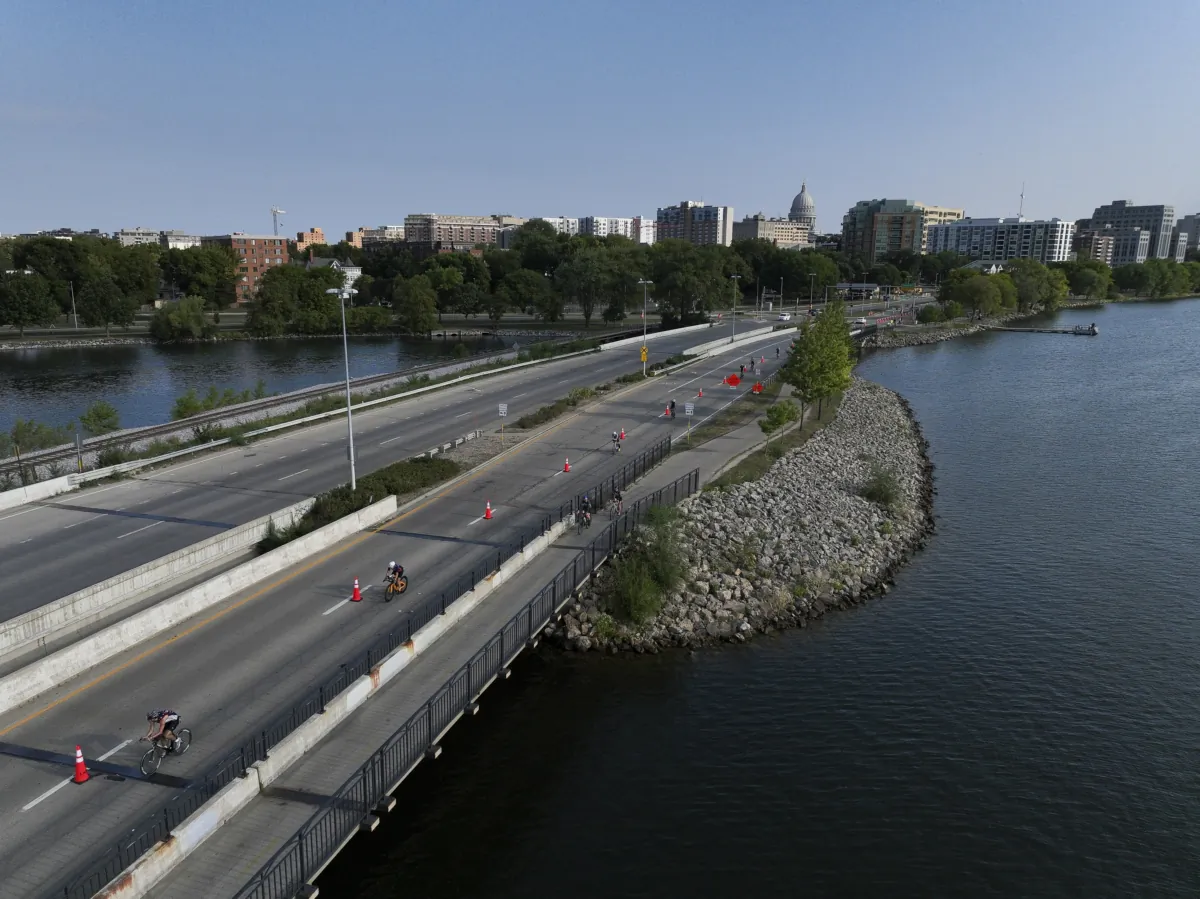 Athletes compete on the bike course at IRONMAN Wisconsin in Madison, Wis., on Sept. 10, 2023. (Patrick McDermott/Getty Images for IRONMAN)