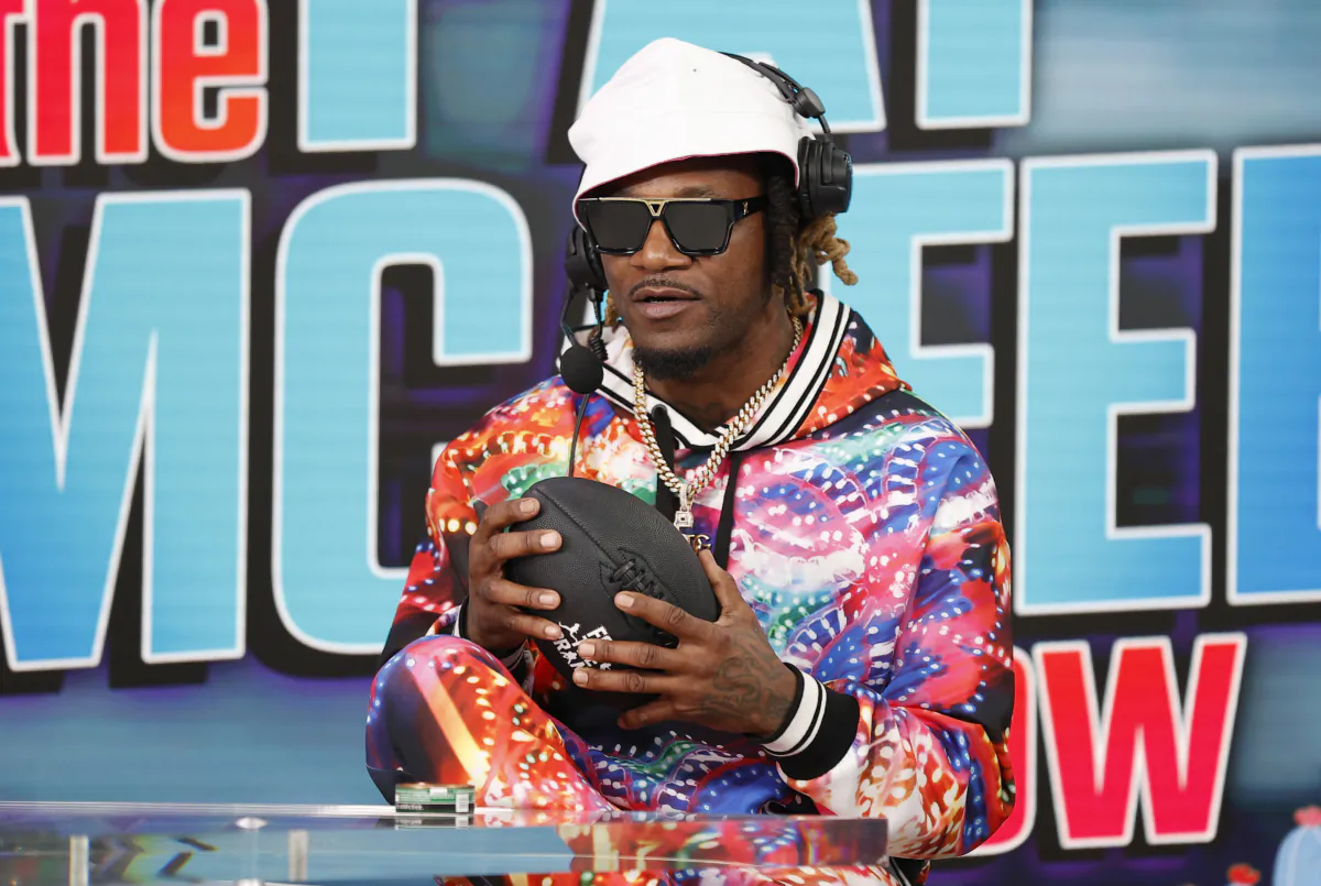 Former NFL player Adam "Pacman" Jones speaks on radio row ahead of Super Bowl LVII at the Phoenix Convention Center in Phoenix on Feb. 9, 2023. (Mike Lawrie/Getty Images)