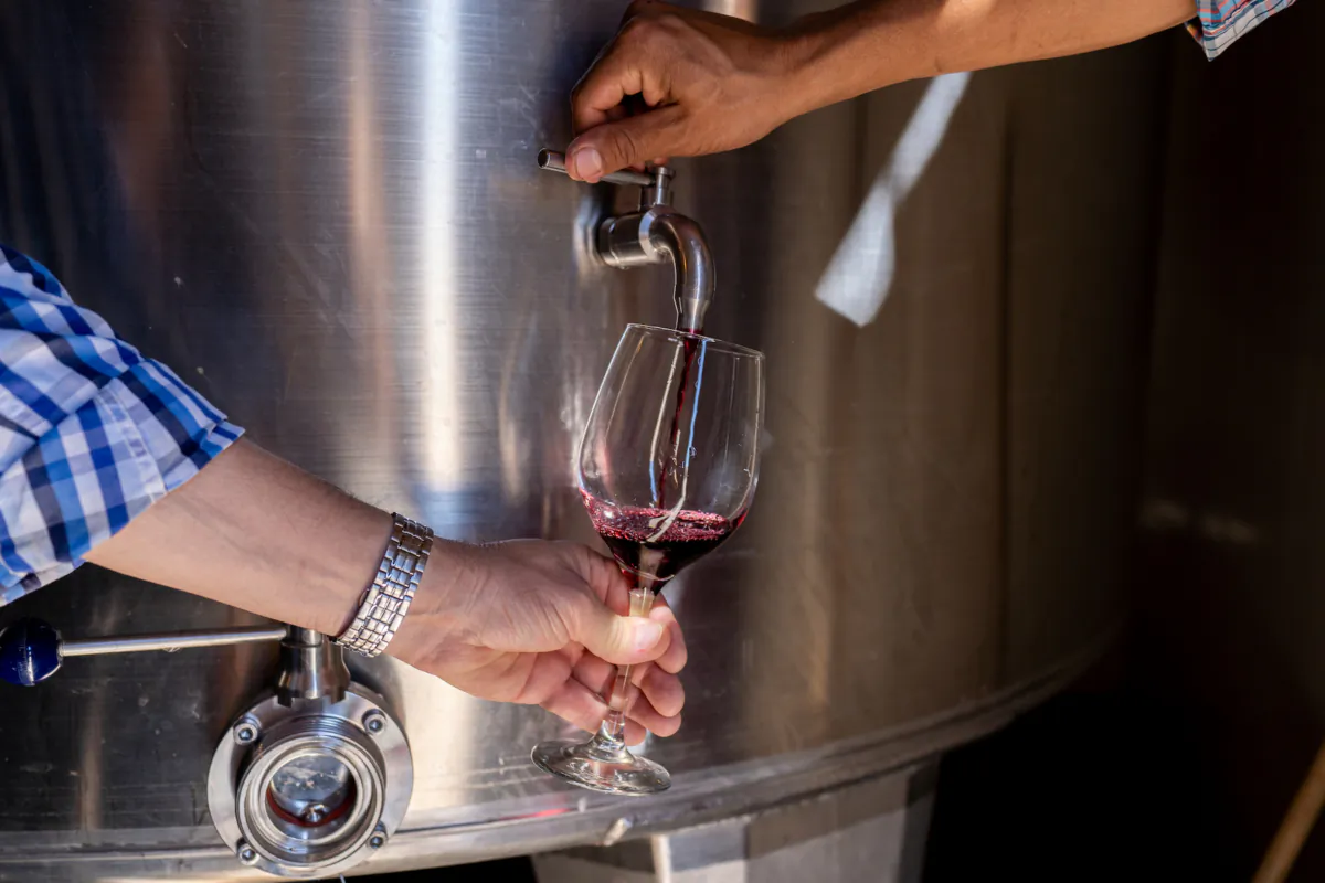 Most of the wine is local, served directly from casks, stainless steel drums, or other large vessels. (Marcos Reppetti/Shutterstock)