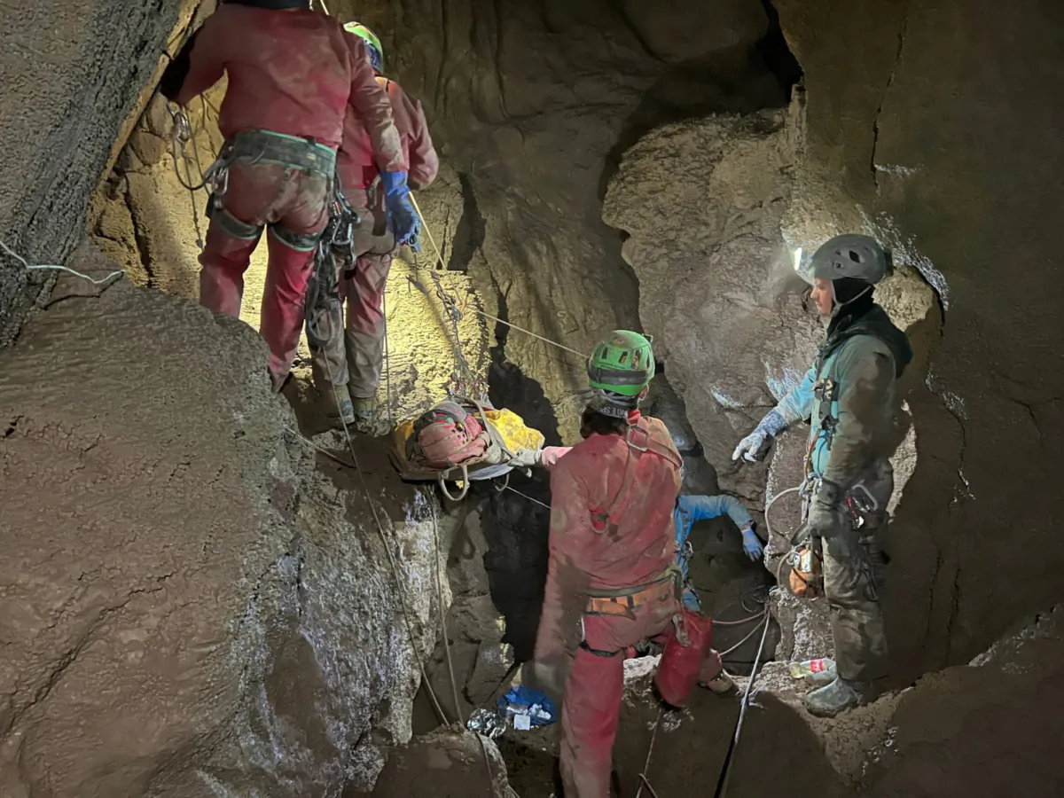 Italian Alpine rescuers (CNSAS) carry U.S. caver Mark Dickey on stretcher as part of a rescue operation in Morca Cave in Mersin province, southern Turkey, on Sept. 11, 2023. (Italian Alpine Rescue/Handout via Reuters)