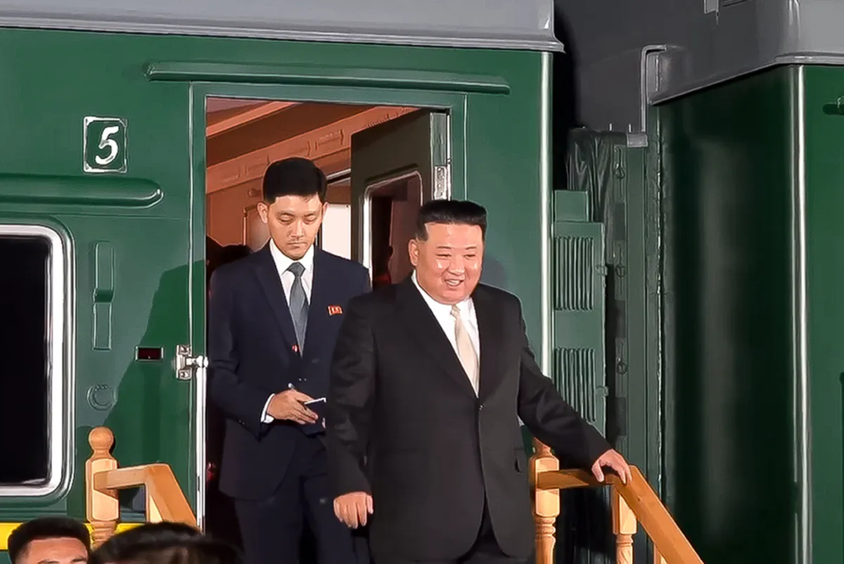 North Korean leader Kim Jong Un steps down from his train after crossing the border to Russia at Khasan, about 127 km (79 miles) south of Vladivostok, Russia, in a still from video released on Sept. 12, 2023. (Governor of the Russian far eastern region of Primorsky Krai Oleg Kozhemyako telegram channel via AP)