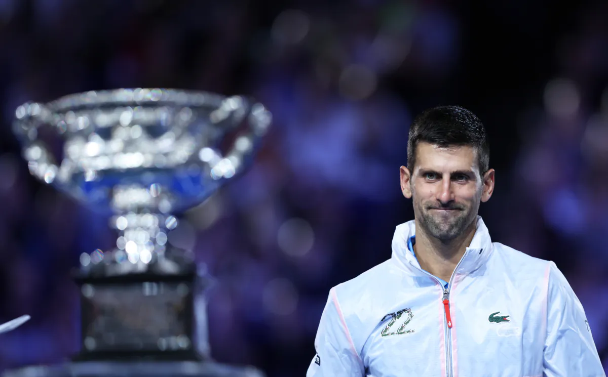Novak Djokovic of Serbia looks on at the Norman Brookes Challenge Cup after winning the Men's Singles Final match against Stefanos Tsitsipas of Greece during day 14 of the 2023 Australian Open at Melbourne Park in Melbourne, Australia, on Jan. 29, 2023. (Clive Brunskill/Getty Images)