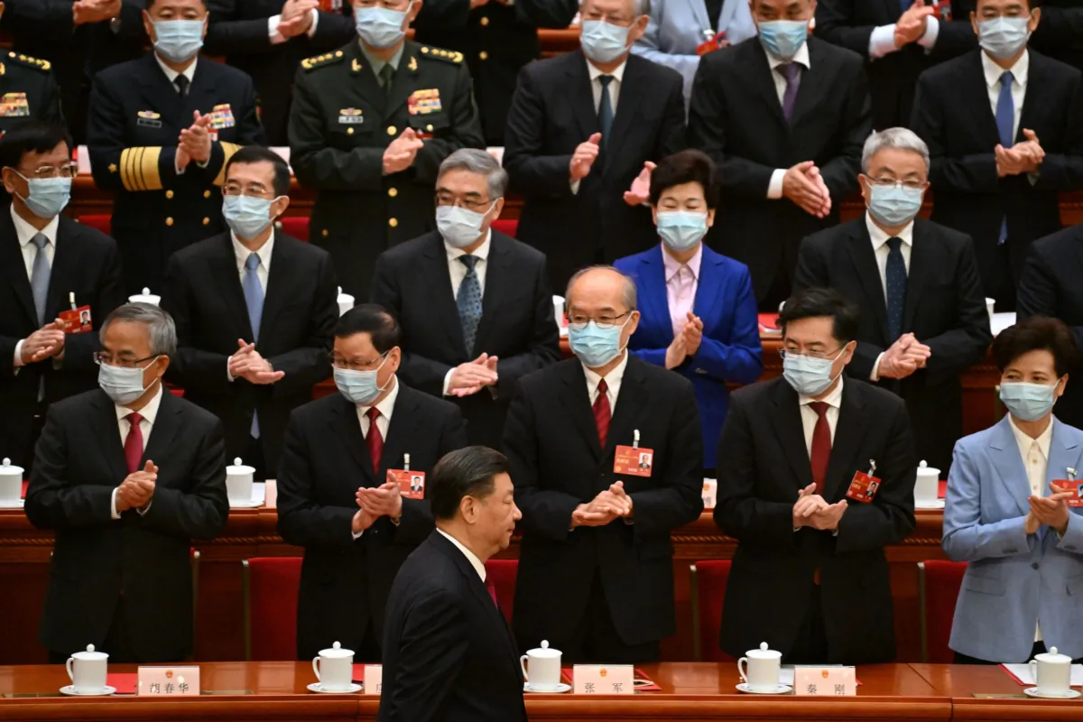 Delegates, including Foreign Minister Qin Gang (2nd R), applaud as Chinese leader Xi Jinping (bottom C) arrives for the closing session of the National People's Congress at the Great Hall of the People in Beijing on March 13, 2023. (Noel Celis/Pool/AFP via Getty Images)