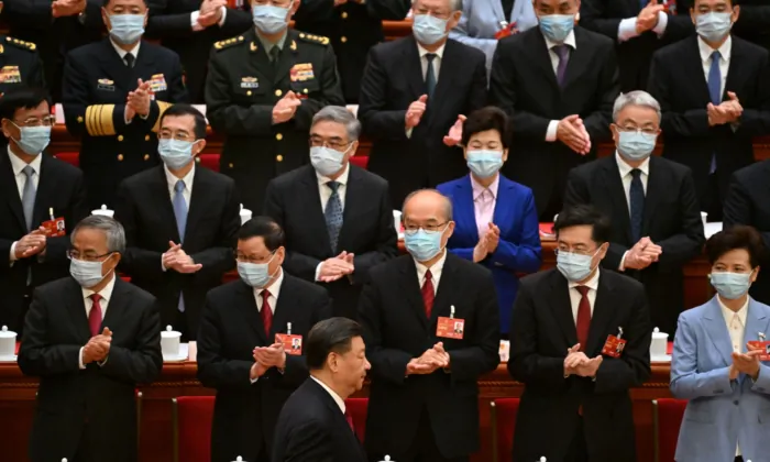 Delegates, including Foreign Minister Qin Gang (2nd R), applaud as Chinese leader Xi Jinping (bottom C) arrives for the closing session of the National People's Congress at the Great Hall of the People in Beijing on March 13, 2023. (Noel Celis/Pool/AFP via Getty Images)